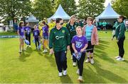 25 July 2023; Ireland captain Laura Delany leads out her team with the mascots before match two of the Certa Women’s One Day International Challenge between Ireland and Australia at Castle Avenue in Dublin. Photo by Sam Barnes/Sportsfile