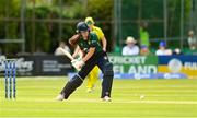 28 July 2023; Ireland batter Cara Murray plays a shot during match three of the Certa Women’s One Day International Challenge series between Ireland and Australia at Castle Avenue Cricket Ground in Dublin. Photo by Seb Daly/Sportsfile