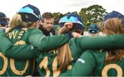 28 July 2023; Ireland head coach Ed Joyce talks to his players after match three of the Certa Women’s One Day International Challenge series between Ireland and Australia at Castle Avenue Cricket Ground in Dublin. Photo by Seb Daly/Sportsfile