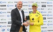 28 July 2023; Ashleigh Gardner of Australia is presented with the player of the series trophy by Cricket Ireland chief executive Warren Deutrom after match three of the Certa Women’s One Day International Challenge series between Ireland and Australia at Castle Avenue Cricket Ground in Dublin. Photo by Seb Daly/Sportsfile