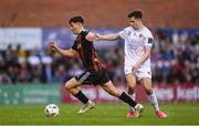 28 July 2023; James Clarke of Bohemians in action against Adam Verdon of UCD during the SSE Airtricity Men's Premier Division match between Bohemians and UCD at Dalymount Park in Dublin. Photo by Ramsey Cardy/Sportsfile