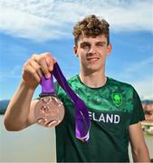 29 July 2023; Cian Crampton of Team Ireland with his discus Bronze medal on the Old Bridge in Maribor during day six of the 2023 Summer European Youth Olympic Festival at in Maribor, Slovenia. Photo by Tyler Miller/Sportsfile