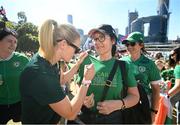 30 July 2023; Diane Caldwell signs a t-shirt for supporter Lorraine McCann, from Cabra in Dublin, during a Republic of Ireland takeover of the FIFA Fan Festival at South Bank Parklands in Brisbane, Australia, ahead of their final Group B match of the FIFA Women's World Cup 2023, against Nigeria. Photo by Stephen McCarthy/Sportsfile