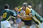 27 June 2004; Richard Brown, Australia, in action against Derick Hougaard (10) and Adrian Fondse, South Africa. IRB U21 World Championship 3rd/4th place play-off Australia v South Africa, Hughenden, Glasgow, Scotland. Picture credit; Brendan Moran / SPORTSFILE
