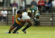 27 June 2004; Luvo Sogidashe, South Africa, in action against Digby Ioane, Australia. IRB U21 World Championship 3rd/4th place play-off Australia v South Africa, Hughenden, Glasgow, Scotland. Picture credit; Brendan Moran / SPORTSFILE