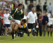 27 June 2004; Hennie Daniller, South Africa, in action against Adam Ashley Cooper, Australia. IRB U21 World Championship 3rd/4th place play-off Australia v South Africa, Hughenden, Glasgow, Scotland. Picture credit; Brendan Moran / SPORTSFILE