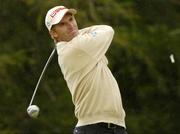 1 July 2004; Padraig Harrington watches his tee shot from the 9th tee box during the Smurfit European Open. South Course, K Club, Straffan, Co. Kildare, Ireland. Picture credit; Matt Browne / SPORTSFILE