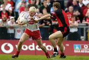 3 July 2004; Owen Mulligan, Tyrone, in action against Alan Molloy, Down. Bank of Ireland Football Championship Qualifier, Round 2, Down v Tyrone, Pairc an Iuir, Newry, Co. Down. Picture credit; Damien Eagers / SPORTSFILE