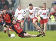 3 July 2004; Sean Cavanagh, Tyrone, in action against Gregory McCartan, Down. Bank of Ireland Football Championship Qualifier, Round 2, Down v Tyrone, Pairc an Iuir, Newry, Co. Down. Picture credit; Damien Eagers / SPORTSFILE