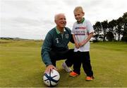 1 September 2013; Republic of Ireland manager Giovanni Trapattoni with 7 year old James Casserly, from Dublin, in attendance at the Heatons / Sportsworld ‘Football in the Community’ partnership launch. Portmarnock Hotel and Golf Links, Portmarnock, Co. Dublin. Picture credit: David Maher / SPORTSFILE