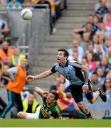 1 September 2013; Michael Darragh MacAuley, Dublin, wins the breaking ball ahead of David Moran, Kerry, which was picked up by Kevin McManamon and led to him scoring Dublin's second goal of the game. GAA Football All-Ireland Senior Championship, Semi-Final, Dublin v Kerry, Croke Park, Dublin. Picture credit: Brendan Moran / SPORTSFILE