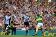 1 September 2013; Bernard Brogan, Dublin, scores a point despite the best efforts of Paul Galvin, left, Mark Griffin, 3, and Donnchadh Walsh, Kerry. GAA Football All-Ireland Senior Championship, Semi-Final, Dublin v Kerry, Croke Park, Dublin. Picture credit: Brendan Moran / SPORTSFILE