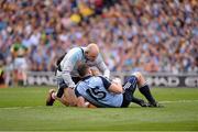 1 September 2013; Bernard Brogan is attended to by Dublin Phisio Kieran O'Reilly.  GAA Football All-Ireland Senior Championship, Semi-Final, Dublin v Kerry, Croke Park, Dublin. Picture credit: Ray McManus / SPORTSFILE