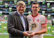 1 September 2013; Conor McKenna, Tyrone, is presented with the Man of the Match award by Pat O'Doherty, Chief Executive, ESB. Electric Ireland GAA Football All-Ireland Minor Championship, Semi-Final, Roscommon v Tyrone, Croke Park, Dublin. Photo by Sportsfile