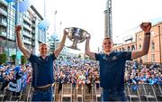 31 July 2023; Paul Mannion, left, and Brian Fenton of Dublin with the Sam Maguire cup during the homecoming celebrations of the Dublin All-Ireland Football Champions at Smithfield Square in Dublin. Photo by Ramsey Cardy/Sportsfile