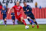4 August 2023; Mark Doyle of St Patrick's Athletic in action against John Brannefalk of Sligo Rovers during the SSE Airtricity Men's Premier Division match between Sligo Rovers and St Patrick's Athletic at The Showgrounds in Sligo. Photo by Tyler Miller/Sportsfile