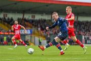4 August 2023; Mark Doyle of St Patrick's Athletic in action against John Brannefalk of Sligo Rovers during the SSE Airtricity Men's Premier Division match between Sligo Rovers and St Patrick's Athletic at The Showgrounds in Sligo. Photo by Tyler Miller/Sportsfile