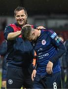 4 August 2023; St Patrick's Athletic manager Jon Daly embraces Chris Forrester of St Patrick's Athletic after their side's victory in the SSE Airtricity Men's Premier Division match between Sligo Rovers and St Patrick's Athletic at The Showgrounds in Sligo. Photo by Tyler Miller/Sportsfile