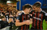 4 August 2023; James Clarke of Bohemians, left, celebrates with teammate Cian Byrne after scoring their side's fourth goal during the SSE Airtricity Men's Premier Division match between Bohemians and Drogheda United at Dalymount Park in Dublin. Photo by Seb Daly/Sportsfile