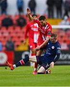 4 August 2023; Stefan Radosavljevic of Sligo Rovers is tackled by Mark Doyle of St Patrick's Athletic during the SSE Airtricity Men's Premier Division match between Sligo Rovers and St Patrick's Athletic at The Showgrounds in Sligo. Photo by Tyler Miller/Sportsfile