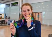 7 August 2023; The 2023 Irish World Para Swimming Championships swimmer Róisín Ní Riain poses for a photograph with her Gold and Silver medals at Dublin Airport on Team Ireland's return from the 2023 World Para Swimming Championships in Manchester. Photo by Tyler Miller/Sportsfile