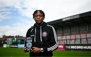 10 August 2023; Jonathan Afolabi of Bohemians with his SSE Airtricity / SWI Player of the Month award for July 2023 at Dalymount Park in Dublin. Photo by Harry Murphy/Sportsfile