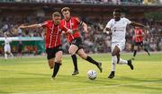 10 August 2023; Serge Déblé of Tobol in action against Ronan Boyce, left, and Cameron McJannet of Derry City during the UEFA Europa Conference League Third Qualifying Round First Leg match between Tobol and Derry City at Kostanay Central Stadium in Kostanay, Kazakhstan. Photo by Kaskyrbai Koishymanov/Sportsfile