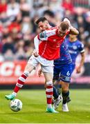 11 August 2023; Mark Doyle of St Patrick's Athletic in action against Jordan Flores of Bohemians during the SSE Airtricity Men's Premier Division match between St Patrick's Athletic and Bohemians at Richmond Park in Dublin. Photo by Eóin Noonan/Sportsfile