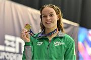 12 August 2023; Ellen Walshe of Ireland celebrates with her gold medal after competing in the women's 400m medley final during day two of the European U23 Swimming Championships at the National Aquatic Centre in Dublin. Photo by Tyler Miller/Sportsfile