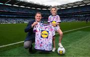 14 August 2023; Lidl Ireland Chief Executive Officer J.P. Scally presented seven-year-old Aoife Callanan with her winning design for the nationwide Ladies Gaelic Football Jersey Design Competition which challenged shoppers to create a bespoke jersey design to celebrate the 50th Anniversary of the Ladies Gaelic Football Association. The presentation took place at Croke Park during the All-Ireland Ladies’ Football Finals on Sunday 13th September. Aoife is from Ballinadee/Ballinspittle, Cork, and plays Ladies Gaelic Football for Courcey Rovers. Lidl will now produce 10,000 of her jersey design which shoppers will be able to access via the Lidl Plus LGFA Rewards Scheme. Aoife and her family, who were Lidl’s guests at the All-Ireland Finals, also received €1,000 in Lidl vouchers for winning the competition. Pictured is competition winner Aoife Callanan and Lidl Ireland Chief Executive Officer J.P. Scally. Photo by Ramsey Cardy/Sportsfile