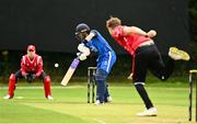 17 August 2023; Josh Manley of Munster Reds delivers to Cormac McLoughlin-Gavin of Leinster Lightning during the Rario Inter-Provincial Cup match between Munster Reds and Leinster Lightning at The Mardyke in Cork. Photo by Eóin Noonan/Sportsfile