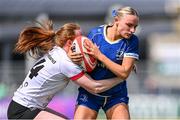 19 August 2023; Emma Tilly of Leinster is tackled by Niamh Marley of Ulster during the Vodafone Women’s Interprovincial Championship match between Leinster and Ulster at Energia Park in Dublin. Photo by Ben McShane/Sportsfile