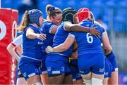 19 August 2023; Leinster players celebrate their fifth try, scored by Katie Whelan, hidden, during the Vodafone Women’s Interprovincial Championship match between Leinster and Ulster at Energia Park in Dublin. Photo by Ben McShane/Sportsfile