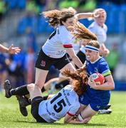 19 August 2023; Ruth Campbell of Leinster is tackled by Ella Durkan, 15, and Abby Moyles of Ulster during the Vodafone Women’s Interprovincial Championship match between Leinster and Ulster at Energia Park in Dublin. Photo by Ben McShane/Sportsfile