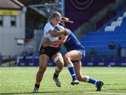 19 August 2023; Beth McBurney of Ulster is tackled by Niamh Murphy of Leinster during the Girl’s Interprovincial Championship match between Leinster and Ulster at Energia Park in Dublin. Photo by John Sheridan/Sportsfile