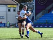 19 August 2023; Beth McBurney of Ulster is tackled by Niamh Murphy of Leinster during the Girl’s Interprovincial Championship match between Leinster and Ulster at Energia Park in Dublin. Photo by John Sheridan/Sportsfile