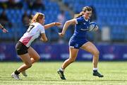 19 August 2023; Heidi Lyons of Leinster evades the tackle of Erin McConalogue of Ulster during the Girl’s Interprovincial Championship match between Leinster and Ulster at Energia Park in Dublin. Photo by Ben McShane/Sportsfile