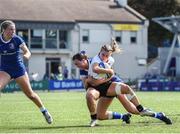 19 August 2023; Beth McBurney of Ulster is tackled by Niamh Murphy of Leinster during the Girl’s Interprovincial Championship match between Leinster and Ulster at Energia Park in Dublin. Photo by John Sheridan/Sportsfile