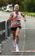 20 August 2023; Michael Harty of East Cork AC, crosses the line to win the Peugeot Race Series Cork City 10 Mile at Cork City in Cork. Photo by Eóin Noonan/Sportsfile