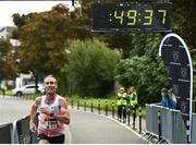 20 August 2023; Michael Harty of East Cork AC, crosses the line to win the Peugeot Race Series Cork City 10 Mile at Cork City in Cork. Photo by Eóin Noonan/Sportsfile