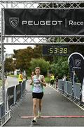 20 August 2023; John Durcan of Togher AC, Cork, crosses the line to finish third in the Peugeot Race Series Cork City 10 Mile at Cork City in Cork. Photo by Eóin Noonan/Sportsfile