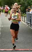 20 August 2023; Lisa Hegarty of Leevale AC, Cork, crosses the line to finish second in the Peugeot Race Series Cork City 10 Mile at Cork City in Cork. Photo by Eóin Noonan/Sportsfile