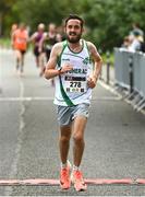 20 August 2023; Brian Madden of Togher AC, crosses the line during the Peugeot Race Series Cork City 10 Mile at Cork City in Cork. Photo by Eóin Noonan/Sportsfile