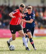 20 August 2023; Will Patching of Derry City in action against Anto Breslin of St Patrick's Athletic during the Sports Direct Men’s FAI Cup Second Round match between Derry City and St Patrick’s Athletic at The Ryan McBride Brandywell Stadium in Derry. Photo by Ben McShane/Sportsfile