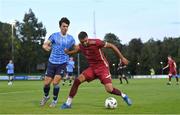 21 August 2023; Wassim Aouachria of Galway United in action against Danú Bishop Kinsella of UCD during the Sports Direct Men’s FAI Cup Second Round match between UCD and Galway United at the UCD Bowl in Dublin. Photo by Ben McShane/Sportsfile