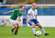 22 August 2023; Marita Á Heyggi of Faroe Islands in action against Heather Loomes of Republic of Ireland during a women's U16 international friendly match between Republic of Ireland and Faroe Islands at Head in the Game Park in Drogheda, Louth. Photo by Ben McShane/Sportsfile