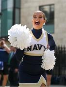 25 August 2023; Navy cheerleader Emily Coates performs a routine at the prestigious Ireland-US CEO Club Lunch, hosted in association with the Aer Lingus College Football Classic, at the Mansion House in Dublin. The lunch offered the perfect entreé to a weekend of fierce football competition as Notre Dame face off against the US Naval Academy at the Aviva Stadium to open the 2023 College Football season. Photo by Brendan Moran/Sportsfile