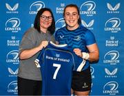 25 August 2023; Molly Boyne is presented with her jersey by former Leinster and Ireland rugby player Yvonne Nolan during a Leinster Rugby Women's jersey presentation at Old Belvedere RFC in Dublin. Photo by Piaras Ó Mídheach/Sportsfile