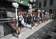 26 August 2023; The University of Notre Dame Cheer Team during the pre-match tailgate on Dame Street, renamed Notre Dame Street for the day, in Dublin ahead of the Aer Lingus College Football Classic match between Notre Dame and Navy in Dublin. Photo by Ramsey Cardy/Sportsfile