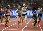 26 August 2023; Kelly McGrory of Ireland takes the baton by Roisin Harrison while competing in the women's 4x400m relay during day eight of the World Athletics Championships at the National Athletics Centre in Budapest, Hungary. Photo by Sam Barnes/Sportsfile